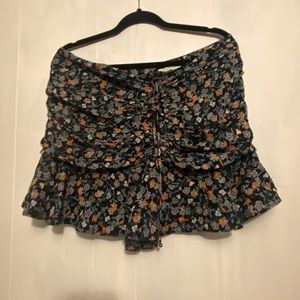 Floral skirt with a cinch in the front